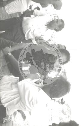 José Dirceu (Brasil, [sem data]) [fotografia] / Fotógrafo(a) : Antônio Tomanini ; Arquivo MST ; Bernardo Fernandes ; Débora Lerrer ; Douglas Mansur ; Mário de Freitas ; Regina Vilela. -- Ref.: BR-SPMST_MST-SN-CIN_AMP_001588-012161-PER.